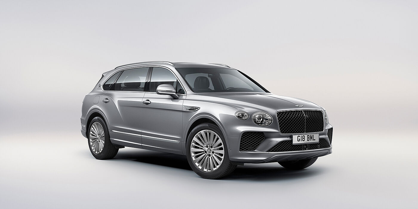 Bentley Phnom Penh Bentley Bentayga Extended Wheelbase luxury SUV front three quarter view in Moonbeam paint with 21 inch five spoke painted wheels