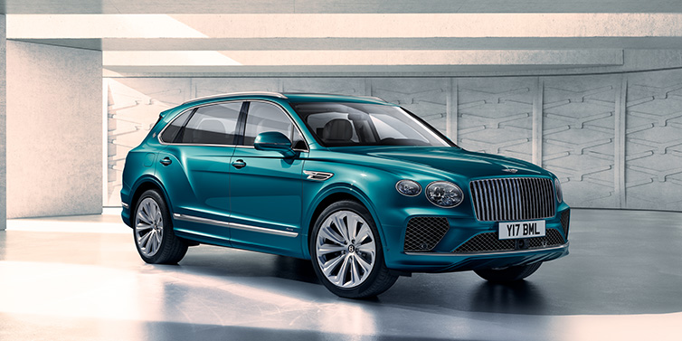 Bentley Phnom Penh Bentley Bentayga Extended Wheelbase Azure SUV front three quarter in Topaz blue paint colour with a grey background