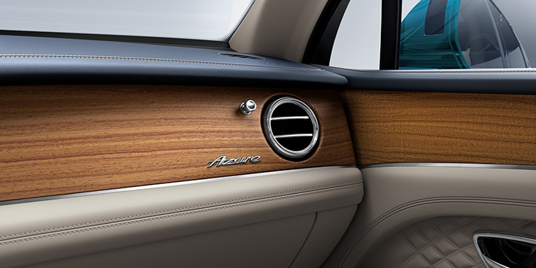 Bentley Phnom Penh Bentley Bentayga Extended Wheelbase Azure front dash showing Open Pore Koa veneer surrounded by Portland and Imperial Blue hides